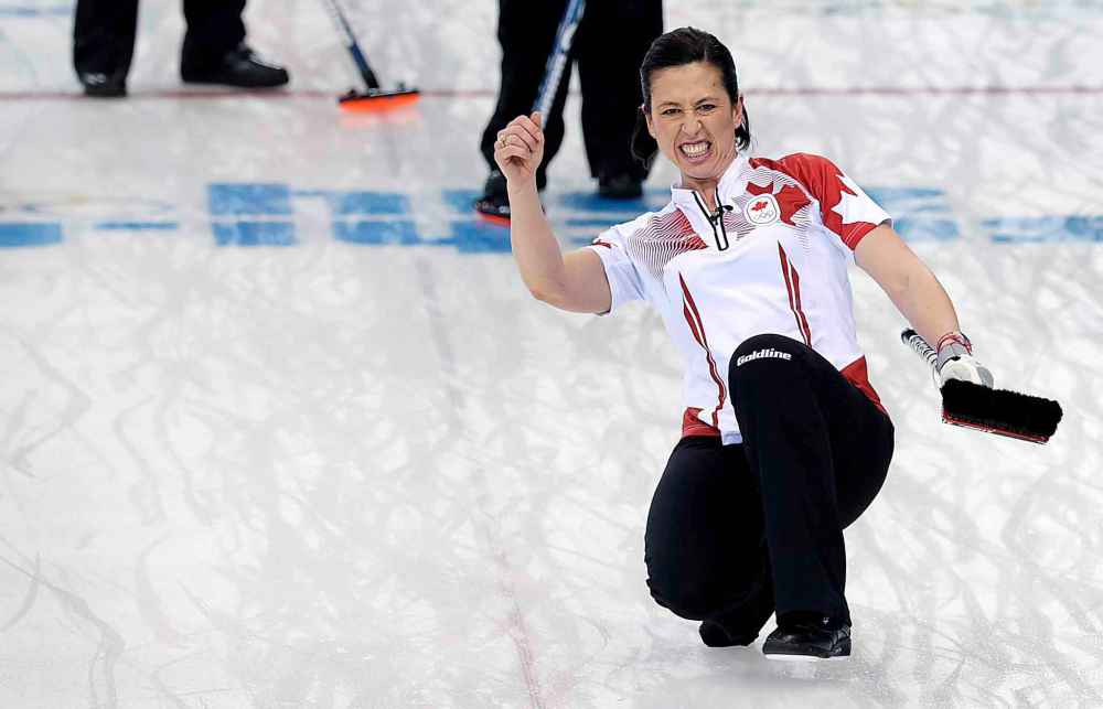 (AP Photo/Wong Maye-E)
Jill Officer reacts after delivering the rock during the women's curling semifinal game against Britain at the 2014 Winter Olympics in Sochi, Russia. Officer's strength and prowess was a weapon for team Jones, one that few others could compete with.