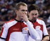 Nathan Denette / The Canadian Press
Skip Jeff Stoughton (left) and third Kevin Park play against Team Howard during the 2009 Canadian Olympic Curling Trials in Edmonton on Saturday. Team Howard defeated Team Stoughton 11-6 to move into the final round.