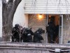 Submitted photo
Police enter a residence in the 2300 block of Pembina Highway.