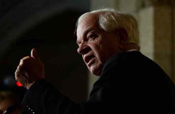Sean Kilpatrick / The Canadian PressMinister of Immigration, Refugees and Citizenship John McCallum speaks to reporters on Parliament Hill to outline a new subcommittee of cabinet that will be overseeing the logistics of bringing in more Syrian refugees.