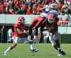 Brant Sanderlin / Atlanta Journal-Constitution /Tribune files
Georgia defenders Branden Smith, left, and Bacarri Rambo break up a pass intended for  New Mexico State's Taveon Rogers during the first half of a game in Athens, Georgia, in November 2011.