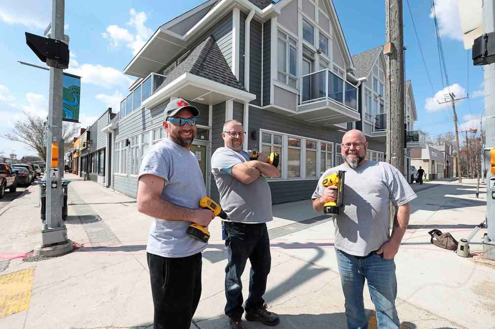 RUTH BONNEVILLE / WINNIPEG FREE PRESS
Family members Steven Lilley (left) and his cousins Carey Reykdal and twin brother Kory Reykdal take a break from building their upscale restaurant and bakery at 101 Regent Ave West in Transcona. The new, multi-use building will house a unique bakery and deli concept on the main floor featuring house-made artisanal baked goods along with a select menu of craft beer and Canadian wines.