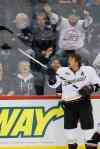 JOHN WOODS / WINNIPEG FREE PRESS
Anaheim Ducks' Teemu Selanne tosses a puck to fans during the pre-game skate of their NHL game against the Winnipeg Jets at the MTS Centre Sunday.