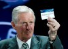 FILE - In this Thursday, Aug. 29, 2013 file photo former Scottish player Billy McNeill, shows the name of FC Bayern Munich, who will play Group D, during the UEFA Champions League draw in Monaco. Legendary former Celtic captain Billy McNeill, the first Briton to lift the European Cup, has died aged 79. (AP Photo/Claude Paris, File)