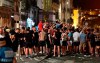 English supporters drink and sing on Friday, June 7, 2019 in the city center of Porto, Portugal, the day after England lost their UEFA Nations League semifinal soccer match against the Netherlands. England will play Switzerland in a third place play-off match on upcoming Sunday. (AP Photo/Martin Meissner)
