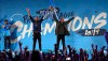 Manchester City coach Pep Guardiola, left, and captain Vincent Kompany hold the trophy as they celebrate with their supporters at the Etihad Stadium in Manchester, England, Sunday May 12, 2019 the day they won the English Premier League title. Manchester City retained the Premier League trophy after coming from behind to beat Brighton 4-1 and see off Liverpool's relentless challenge on the final day of the season on Sunday. (AP Photo/Jon Super)