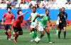 South Korea's Jung Seol-bin, left, challenges Nigeria's Chinaza Uchendu during the Women's World Cup Group A soccer match between Nigeria and South Korea in Grenoble, France, Wednesday June 12, 2019.(AP Photo/Laurent Cipriani)