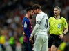 Barcelona forward Lionel Messi, left, goes head to head with Real defender Sergio Ramos after they argue during the Spanish La Liga soccer match between Real Madrid and FC Barcelona at the Bernabeu stadium in Madrid, Saturday, March 2, 2019. (AP Photo/Manu Fernandez)