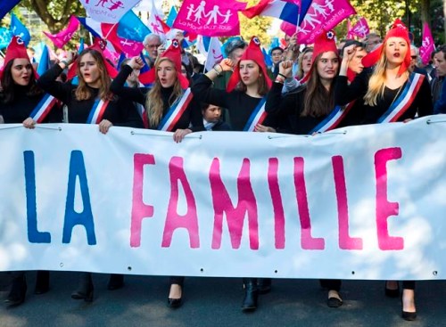 FILE - In this Sunday, Oct. 16, 2016 file photo, demonstrators hold a banner reading 