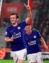 Leicester's Ben Chilwell celebrates scoring the opening goal during the English Premier League soccer match between Southampton and Leicester City at St Mary's stadium in Southampton, England Friday, Oct., 25, 2019. (AP Photo/Alastair Grant)