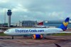 FILE - In this Aug. 13, 2019 file photo a Thomas Cook plane taxis on the runway at terminal one of Manchester Airport, England. More than 600,000 vacationers who booked through tour operator Thomas Cook were on edge Sunday, wondering if they will be able to get home, as one of the world's oldest and biggest travel companies teetered on the edge of collapse. The debt-laden company, which confirmed Friday it was seeking 200 million pounds ($250 million) in funding to avoid going bust, was in talks with shareholders and creditors to stave off failure. (Peter Byrne/PA via AP)