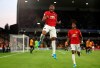 Manchester United's Anthony Martial celebrates scoring his side's first goal of the game during the Premier League match against Wolverhampton Wanderers at Molineux, Wolverhampton, England, Monday Aug. 19, 2019. (Nick Potts/PA via AP)