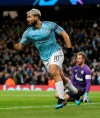 Manchester City's Sergio Aguero celebrates after scoring during the Champions League round of 16 second leg, soccer match between Manchester City and Schalke 04 at Etihad stadium in Manchester, England, Tuesday, March 12, 2019. (Martin Rickett/PA via AP)