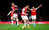 Crystal Palace's Andros Townsend is sandwiched by Arsenal's Calum Chambers, left, and Granit Xhaka during the English Premier League soccer match at the Emirates Stadium, London, Sunday Oct. 27, 2019. (Nigel French/PA via AP)