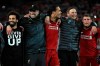 Liverpool's Mohamed Salah, Manager Jurgen Klopp, Virgil van Dijk, Assistant manager Pepijn Lijnders and James Milner, from left, celebrate after the Champions League Semi Final, second leg soccer match between Liverpool and Barcelona at Anfield, Liverpool, England, Tuesday, May 7, 2019. Liverpool won the match 4-0 to overturn a three-goal deficit to win the match 4-3 on aggregate. (Peter Byrne/PA via AP)