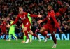 Liverpool's Georginio Wijnaldum, right, celebrates scoring his side's third goal of the game during the Champions League Semi Final, second leg soccer match between Liverpool and Barcelona at Anfield, Liverpool, England, Tuesday, May 7, 2019. (Peter Byrne/PA via AP)