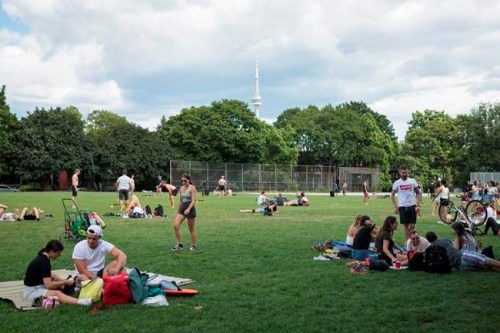 People enjoy Trinity Bellwoods Park in Toronto on Saturday, August 10, 2019. THE CANADIAN PRESS/ Tijana Martin
