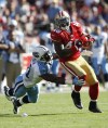 Marcio Sanchez / The Associated Press
Tennessee Titans linebacker Gerald McRath tries to bring down San Francisco 49ers tight end Delanie Walker in 2009.
