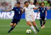 FILE - In this June 19, 2019, file photo, Japan's Hina Sugita, left, and England's Georgia Stanway, right, challenge for the ball during the Women's World Cup Group D soccer match between Japan and England at the Stade de Nice in Nice, France. The first-ever Manchester derby in the Women’s Super League opens the season when the competition is still a boost in crowds after the big interest in England’s run to the Women’s World Cup semifinals. (AP Photo/Claude Paris, File)