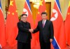 FILE- In this June 19, 2018, file photo provided by China's Xinhua News Agency, Chinese President Xi Jinping, right, shakes hands with North Korean leader Kim Jong Un, during a welcome ceremony at the Great Hall of the People in Beijing. Kim arrived in Beijing on Tuesday, Jan. 8, 2019 for his fourth summit with China‚Äôs Xi Jinping. Kim‚Äôs first foray outside of North Korea as leader was for a summit with Xi last March. The two met again in May and June, just ahead of and just after Kim‚Äôs June 12 summit with Trump in Singapore. (Ju Peng/Xinhua via AP, File)