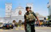FILE - In this April 21, 2019 file photo, Sri Lankan Army soldiers secure the area around St. Anthony's Shrine after a blast in Colombo, Sri Lanka. Sri Lanka's attorney general advised the acting police chief on Monday, June 24, 2019, to launch a criminal investigation of the former defense secretary over 