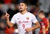 FILE - In this May 10, 2017, file photo, then Shanghai SIPG's Elkeson celebrates after scoring against Western Sydney Wanderers during their Asian Football Confederation Champions League soccer match in Sydney. Brazilian-born striker Elkeson is set to be in the thick of action for Guangzhou Evergrande as the Asian Champions League enters the quarterfinals stage. Elkeson is the talk of Asian soccer after becoming the first player of non-Chinese heritage to be selected for the China national team. (AP Photo/Rick Rycroft, File)