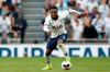 In this Sept. 15, 2019, photo, Tottenham Hotspur's Danny Rose takes the ball forward during an English Premier League soccer match between Tottenham Hotspur and Crystal Palace at White Hart Lane in London. The number of soccer players seeking support for mental health issues in England is surging. Only 160 Professional Footballers’ Association members accessed counselling services from the union in 2016. But any stigma around seeking help for mental health problems has been eased in the national sport by leading players, including Rose, talking about fighting depression. (AP Photo/Alastair Grant)