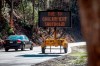 In this Saturday, Jan. 5, 2019, photo visitors to Great Smoky Mountain National Park drive through the park but facilities like the Sugarlands and Cades Cove visitor centers in Townsend, Tenn. Nonprofits, businesses and state governments nationwide are putting up money and volunteer hours in a battle to keep national parks safe and clean for visitors as the partial U.S. government shutdown lingers. (Robert Berlin/The Daily Times via AP)