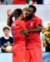 United States forward Jozy Altidore (17) congratulates midfielder Weston McKennie (8) after McKennie scored a goal against Jamaica during the first half of a CONCACAF Gold Cup semifinal soccer match Wednesday, July 3, 2019, in Nashville, Tenn. (AP Photo/Mark Zaleski)