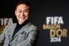 FILE - In this Jan. 12, 2015 file photo, Norio Sasaki, the head coach of the Japanese women's national soccer team, one of the nominees of the Women's World Coach of the Year, attends a press conference prior to the FIFA Ballon d'Or awarding ceremony at the Kongresshaus in Zurich, Switzerland. Defending champion Japan heads into the Women's World Cup relying heavily on the experienced players which led it to success in 2011, and confident it can repeat that triumph. Sasaki will rely on many of the same players who led Japan to that first World Cup title. Of the 23 women selected for this year's tournament in Canada, 17 were members of the squad in Germany. (AP Photo/Keystone, Walter Bieri, File)
