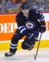 Boris Minkevich / Winnipeg Free Press Files
Jets D-man Jacob Trouba plays with an edge that belies his usually  happy-go-lucky personality  off the ice.