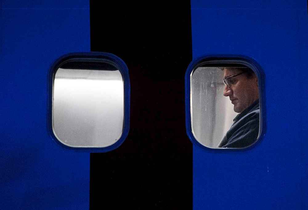 THE CANADIAN PRESS/Sean Kilpatrick
Liberal Leader Justin Trudeau waits to take off on his campaign plane after attending the rally in Winnipeg, Saturday.