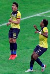 Ecuador's Angel Mena, left, celebrates scoring his team's equalizer against Japan, as teammate Romario Ibarra runs next to him during a Copa America Group C soccer match at the Mineirao stadium in Belo Horizonte, Brazil, Monday, June 24, 2019. (AP Photo/Natacha Pisarenko)