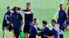 Juventus forward Cristiano Ronaldo, 3rd from left, jokes with teammate Blaise Matuidi and Miralem Pjanic, left, during a training session ahead f Tuesday's Champions League, quarter final second leg soccer match between Juventus and Ajax, at the Juventus sport center, near Turin, Italy, Monday, April 15, 2019. (Alessandro Di Marco/ANSA via AP)