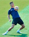 Juventus forward Cristiano Ronaldo receives the ball during a training session on the eve of the first quarterfinal match against Ajax, in Turin, Italy, April 9, 2019. (Alessandro Di Marco/ANSA via AP)