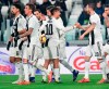 Juventus's Leonardo Bonucci, right, celebrates with teammate Paulo Dybala after scoring during the Serie A soccer match between Juventus and Frosinone at the Allianz Stadium in Turin, Italy, Friday, Feb. 15, 2019. (Alessandro Di Marco/ANSA via AP)
