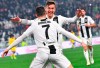 Juventus' Cristiano Ronaldo celebrates with his teammate Paulo Dybala after scoring during the Serie A soccer match between Juventus and Frosinone at the Allianz Stadium in Turin, Italy, Friday, Feb. 15, 2019. (Alessandro Di Marco/ANSA via AP)