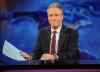 This Nov. 30, 2011 file photo shows television host Jon Stewart during a taping of 