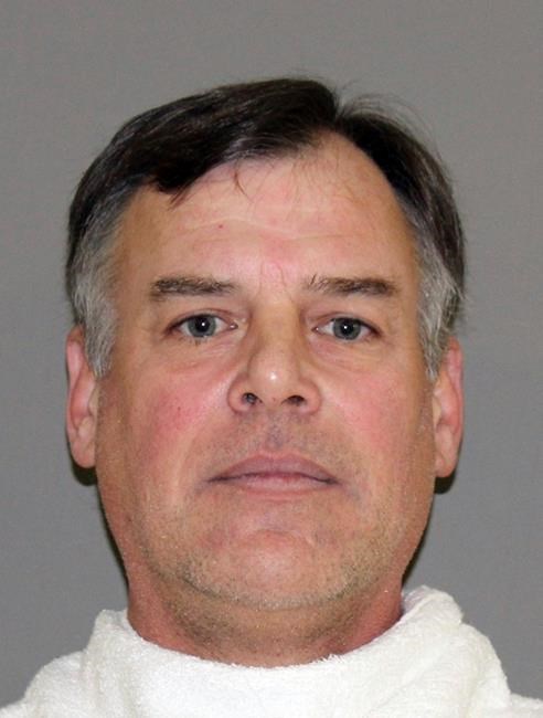 FILE - This undated file photo provided by the Denton County Jail shows John Wetteland. An attorney for Wetteland, Derek Adame said Monday, May 13, 2019 that his client is “completely chocked” by the allegations as the former All-Star and World Series MVP pitcher made his first court appearance in Texas on child sex abuse charges nearly five months after his arrest. (Denton County Jail via AP, File)