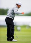 Sung Kang reacts after sinking a putt on the 18th during the second round of the Byron Nelson golf tournament at Trinity Forest on Friday, May 10, 2019, in Dallas. (Ashley Landis/The Dallas Morning News via AP)