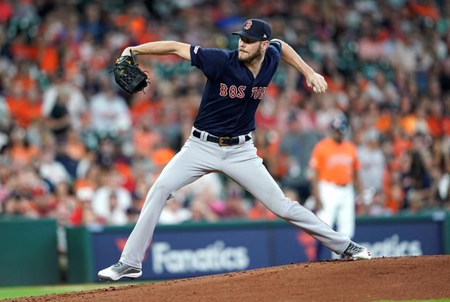 Boston Red Sox starting pitcher Chris Sale throws during the first inning of a baseball game against the Houston Astros Friday, May 24, 2019, in Houston. (AP Photo/David J. Phillip)