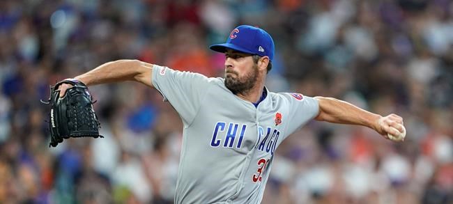 Chicago Cubs starting pitcher Cole Hamels throws against the Houston Astros during the first inning of a baseball game Monday, May 27, 2019, in Houston. (AP Photo/David J. Phillip)