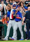 Chicago Cubs' Albert Almora Jr., right, is comforted by Jason Heyward after checking on an injured fan from his foul ball during the fourth inning of a baseball game against the Houston Astros Wednesday, May 29, 2019, in Houston. (AP Photo/David J. Phillip)