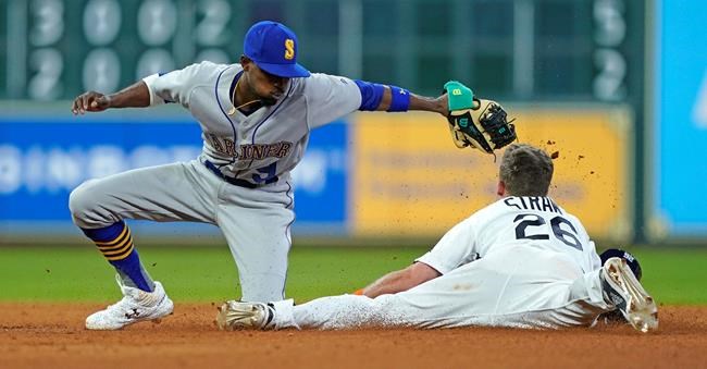 Houston Astros' Myles Straw (26) steals second base as Seattle Mariners' Dee Gordon (9) reaches to tag him during the seventh inning of a baseball game Friday, June 28, 2019, in Houston. (AP Photo/David J. Phillip)