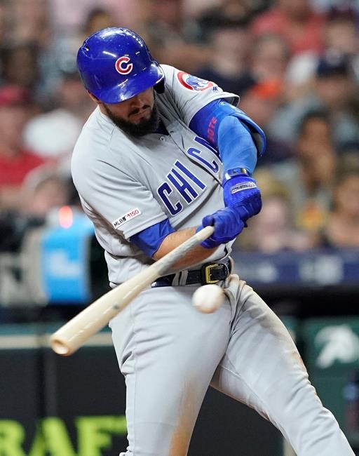 Chicago Cubs' David Bote hits a two-run home run against the Houston Astros during the sixth inning of a baseball game Tuesday, May 28, 2019, in Houston. (AP Photo/David J. Phillip)
