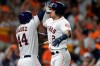 Houston Astros' Alex Bregman (2) celebrates his solo home run against the Tampa Bay Rays with Yordan Alvarez during the fourth inning of Game 2 of a baseball American League Division Series in Houston, Saturday, Oct. 5, 2019. (AP Photo/Michael Wyke)