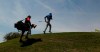 Tiger Woods, right, climbs to the first green after hitting a shot during round-robin play at the Dell Match Play Championship golf tournament, Wednesday, March 27, 2019, in Austin, Texas. (AP Photo/Eric Gay)