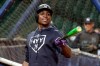 New York Yankees shortstop Didi Gregorius jokes with teammates during batting practice for a baseball American League Championship Series in Houston, Friday, Oct. 11, 2019. The Yankees are scheduled to face the Houston Astros starting Saturday. (AP Photo/Eric Gay)