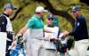 Sergio Garcia, second from left and Matt Kuchar, right, discuss on the eighth hole what had happened on the seventh green, during the Dell Technologies Match Play Championship golf tournament, Saturday, March 30, 2019, in Austin, Texas. Garcia had an 8-foot putt to win the seventh hole and left it 4 inches short, a frustrating miss. Worse yet was what followed. Such a tap-in typically is conceded in the Dell Technologies Match Play, and the Spaniard walked up and casually rapped it left-handed. The ball spun around the cup, and he picked it up and walked off the green, assuming he remained 1 down through seven holes. One problem: Matt Kuchar never formally conceded the putt. (AP Photo/Eric Gay)