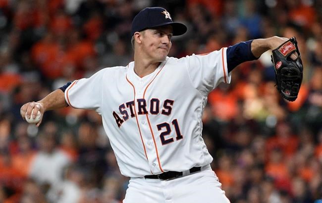 Houston Astros starting pitcher Zack Greinke delivers during the first inning of the team's baseball game against the Colorado Rockies, Tuesday, Aug. 6, 2019, in Houston. (AP Photo/Eric Christian Smith)